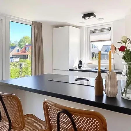 Modern Coastal Retreat With Garden